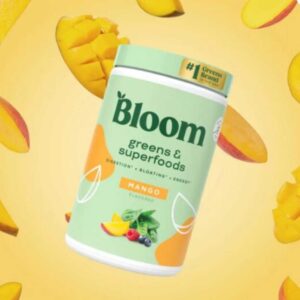 Suplemento Bloom Mango con fondo de frutas tropicales