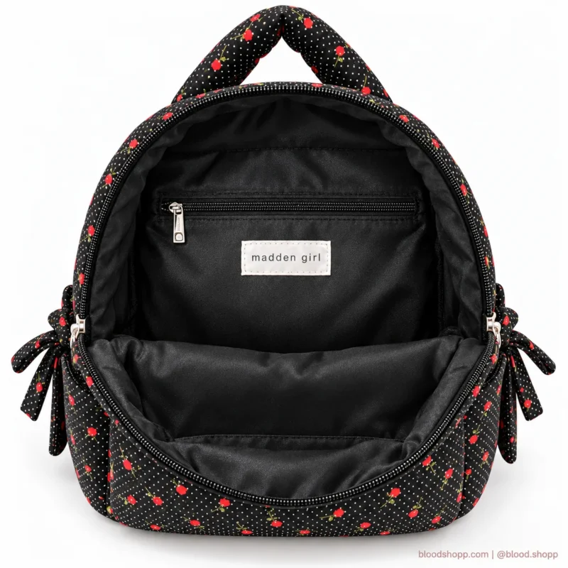 Mochila Mini Madden Girl Negra/Crema con Rosas y Carterita Desmontable