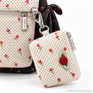 Mochila Mini Madden Girl Negra/Crema con Rosas y Carterita Desmontable